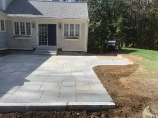 Bluestone patio addition with grill and new sod