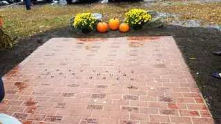 Engraved memorial brick paver patio with chrysanthemum plantings