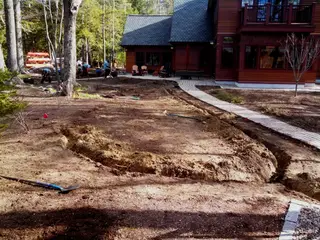 Rustic building landscape under active construction and grading