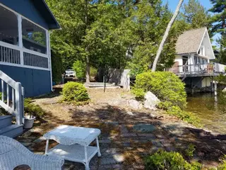 Waterfront landscape installation in progress along shoreline