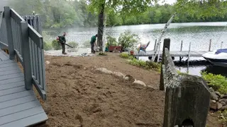 Waterfront property under active landscape grading and construction
