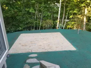 Hydroseed installation in wooded residential setting