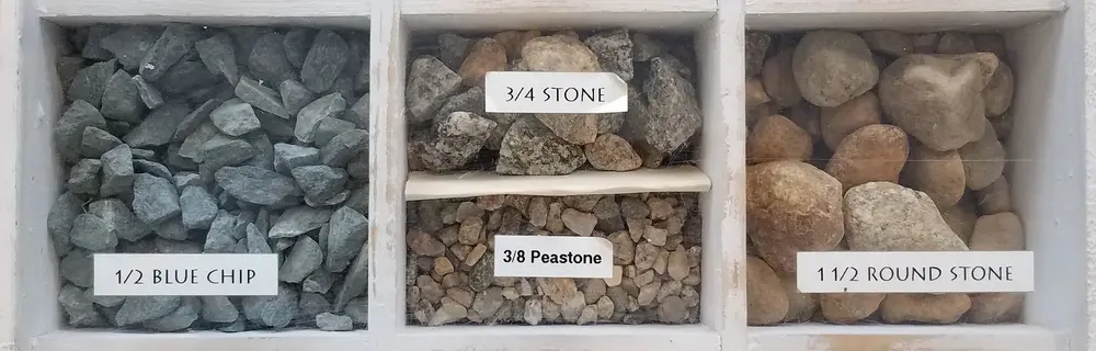 Display bins of blue chip stone and pea stone