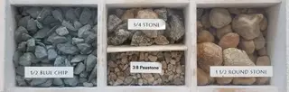 Display bins of blue chip, stone, and peastone