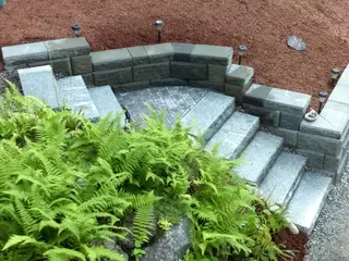 Aerial view of curved seat wall and steps