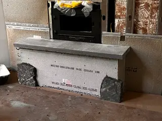 Bluestone hearth shelf above fireplace insert