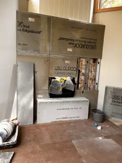 Cement board prep for stone fireplace surround