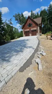 Granite cobblestone driveway before mountain chalet