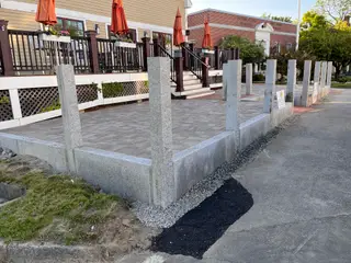 Granite cobblestone driveway to timber carriage house