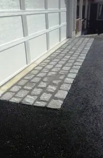 Granite cobblestone garage apron