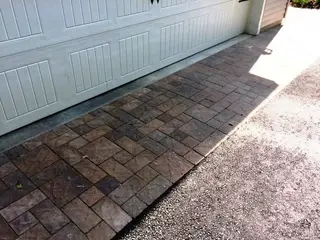 Herringbone paver driveway apron