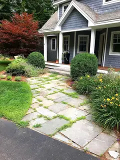 Irregular flagstone walkway with grass joints