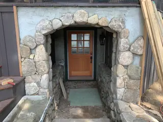 Round stone archway entrance under construction