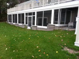Screened porch with stone pier foundation